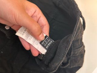 Pantalones vaqueros negros rotos