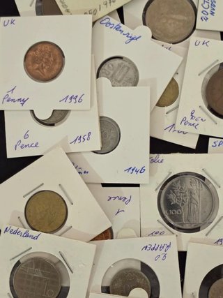 Collezione di 100 monete incapsulate