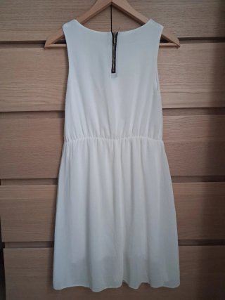 Vestido blanco con abalorios