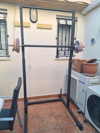 Jaula para barra de pesas