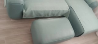 Sofá chaise longue con puff  color verde azulado