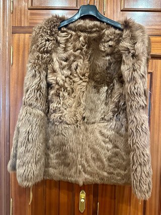 Chaleco de piel con pelo