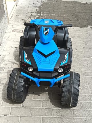 Quad eléctrico infantil azul poco uso