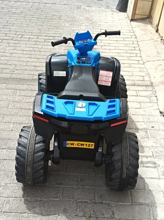 Quad eléctrico infantil azul poco uso