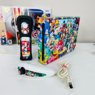 Nintendo Wii con Skin e Controller + 5 giochi