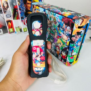 Nintendo Wii con Skin e Controller + 5 giochi