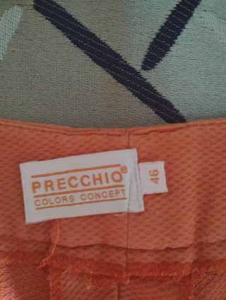 Pantalones naranjas Precchio Talla 46.