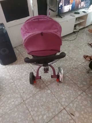 Bicicleta infantil con toldo