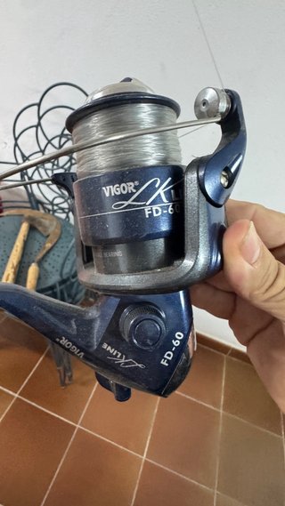 Caña de pescar con carrete