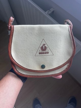 Bolso vintage de lona y cuero
