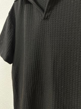 Polo negro de hombre