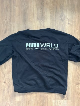 Sudadera con Capucha Puma WRLD Negra Estampada