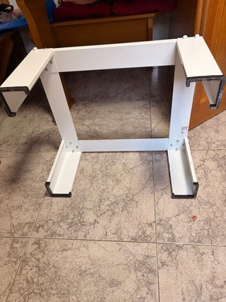 Soporte elevador de hierro para lavadoras