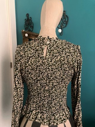 Top manga larga estampado