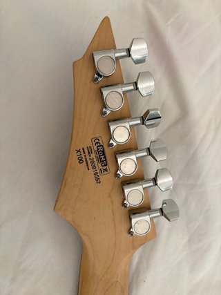 Guitarra Eléctrica Cort X100 Negra con funda.