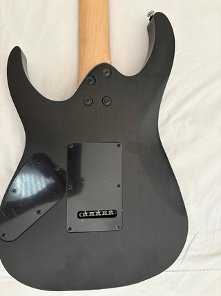 Guitarra Eléctrica Cort X100 Negra con funda.