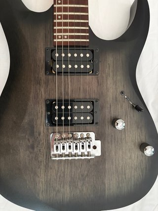 Guitarra Eléctrica Cort X100 Negra con funda.