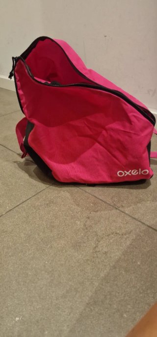 Patines rosas + mochila + fundas