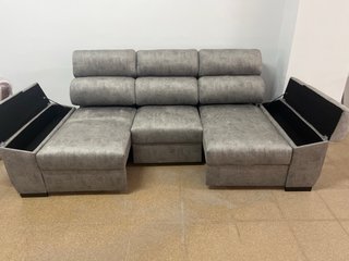Sofá gris con asientos deslizantes