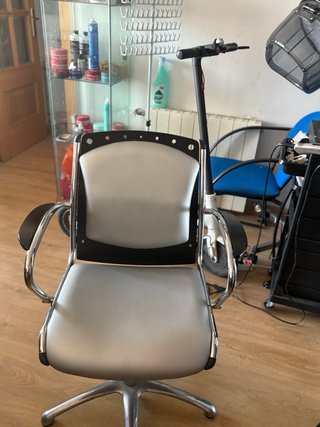 Sillón de peluquería giratorio