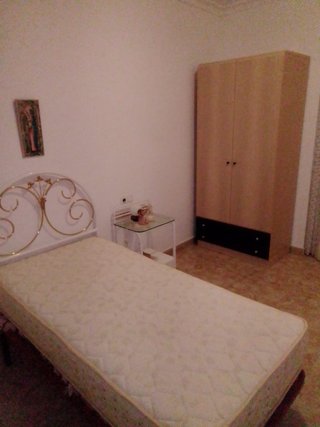 Dormitorio: Cabezal, Mesita y Armario