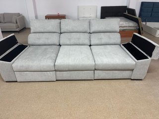 Sofá chaise longue gris con asientos deslizantes