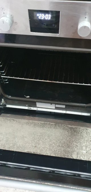 Cocina completa madera y azul. Granito marron