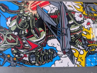 Skate Oxelo Mid 5 con diseño Robot. Como nuevo