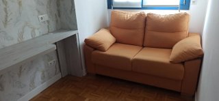 Sofá Cama  Tela color Mostaza.