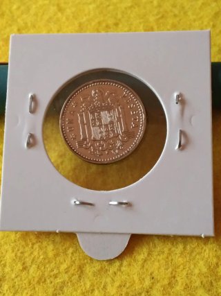 Rara Moneda 1 pts 1966 España estrella 73.plateada