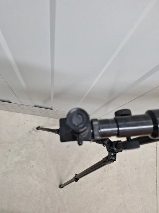 Telescopio infantil azul con trípode