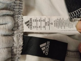 Pantalón chándal Adidas gris jaspeado