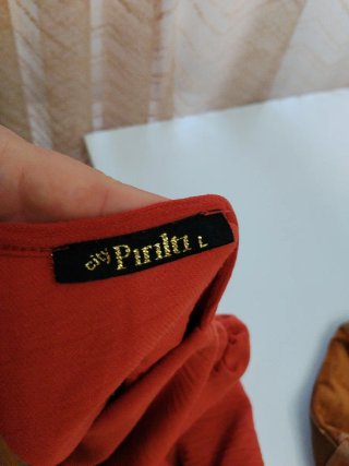 Blusa naranja con manga corta
