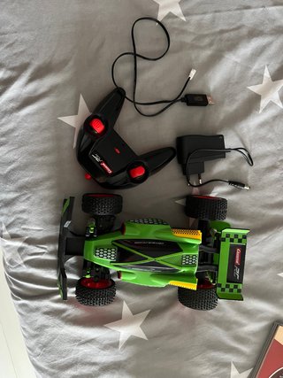 Coche RC Carrera en buen estado