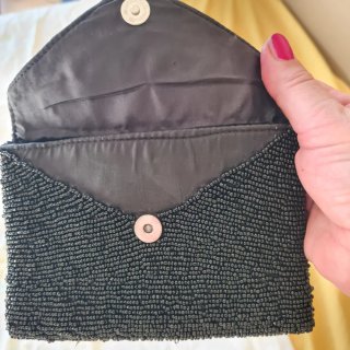 Pochette corallini neri e multicolor