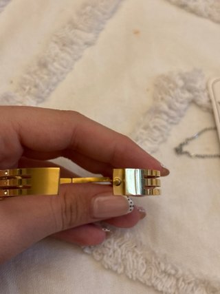 Pulsera Cartier rígida dorada con diamantes