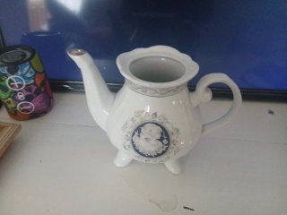 Tetera de porcelana vintage azul y blanca