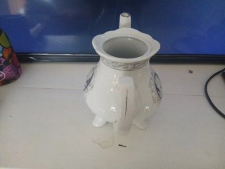 Tetera de porcelana vintage azul y blanca