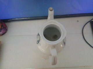 Tetera de porcelana vintage azul y blanca