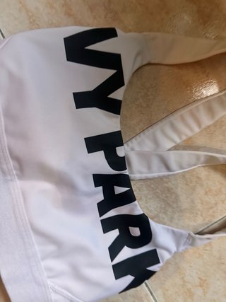 Top deportivo Ivy Park blanco