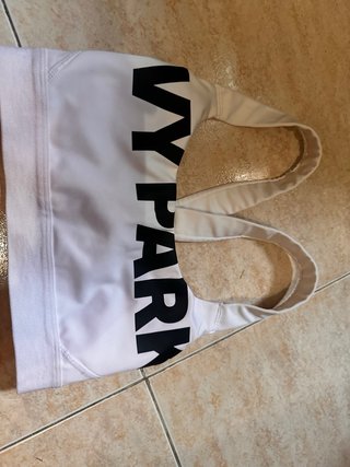 Top deportivo Ivy Park blanco