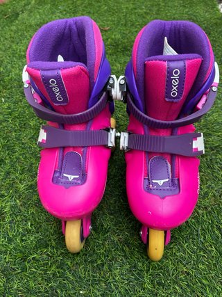 Patines infantiles Oxelo rosas y morados