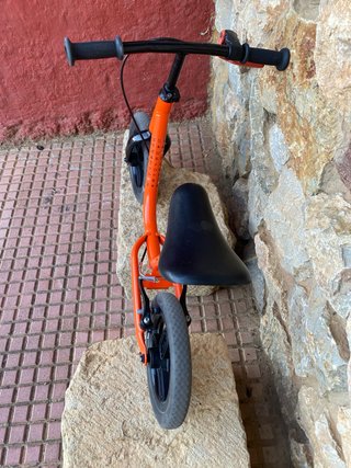 Bicicleta de equilibrio Decathlon naranja