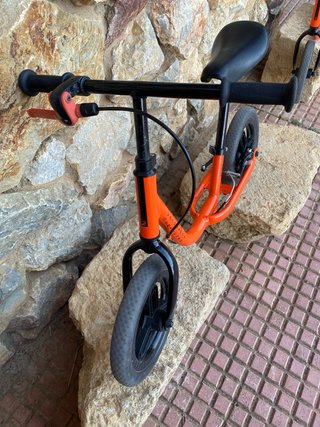 Bicicleta de equilibrio Decathlon naranja