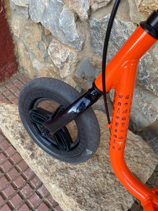 Bicicleta de equilibrio Decathlon naranja