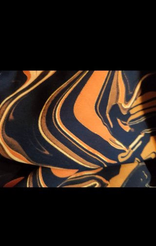 Pantalones acampanados con estampado