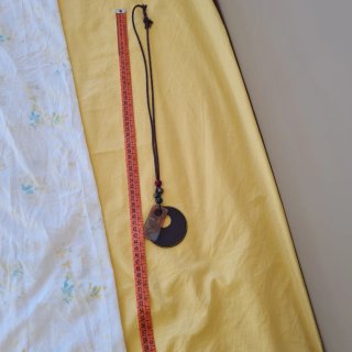 Collana con pendente rotondo