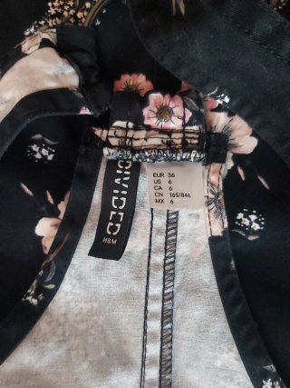 Peto corto floral negro