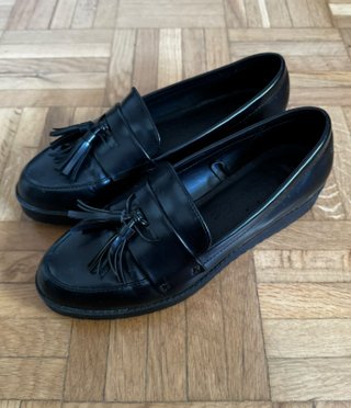 Mocasines negros de vestir con borlas