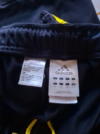 Pantalón de chándal Adidas negro y amarillo